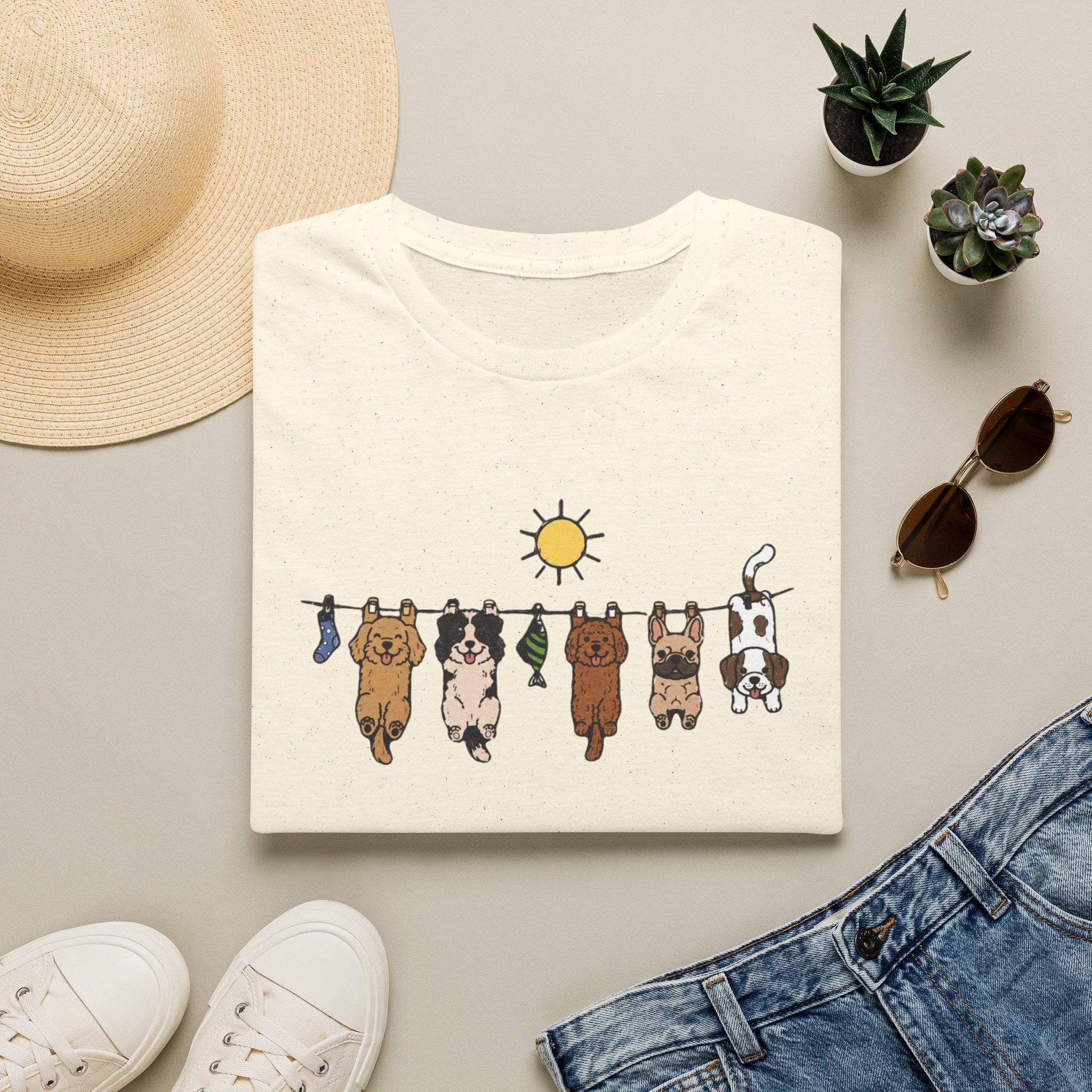 Dog Clothesline Cute Graphic T-Shirt — Hanging Puppies Design